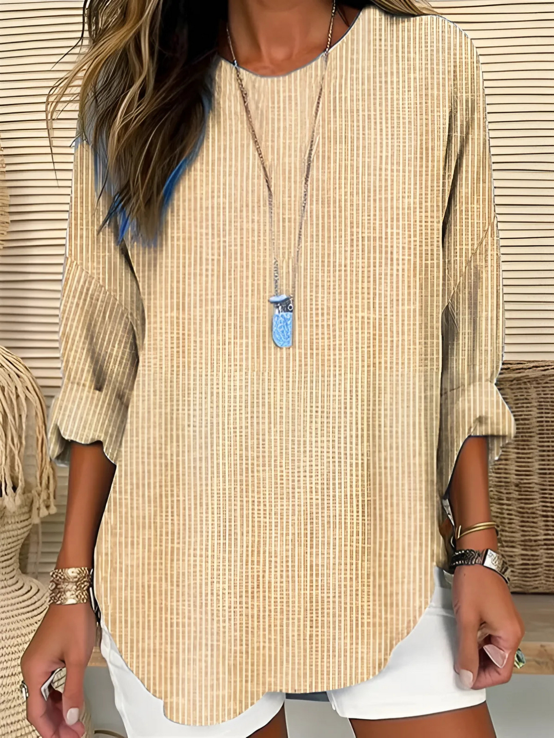 Elegant women's khaki striped blouse with a relaxed fit. Trendy casual chic shirt, perfect for everyday style.