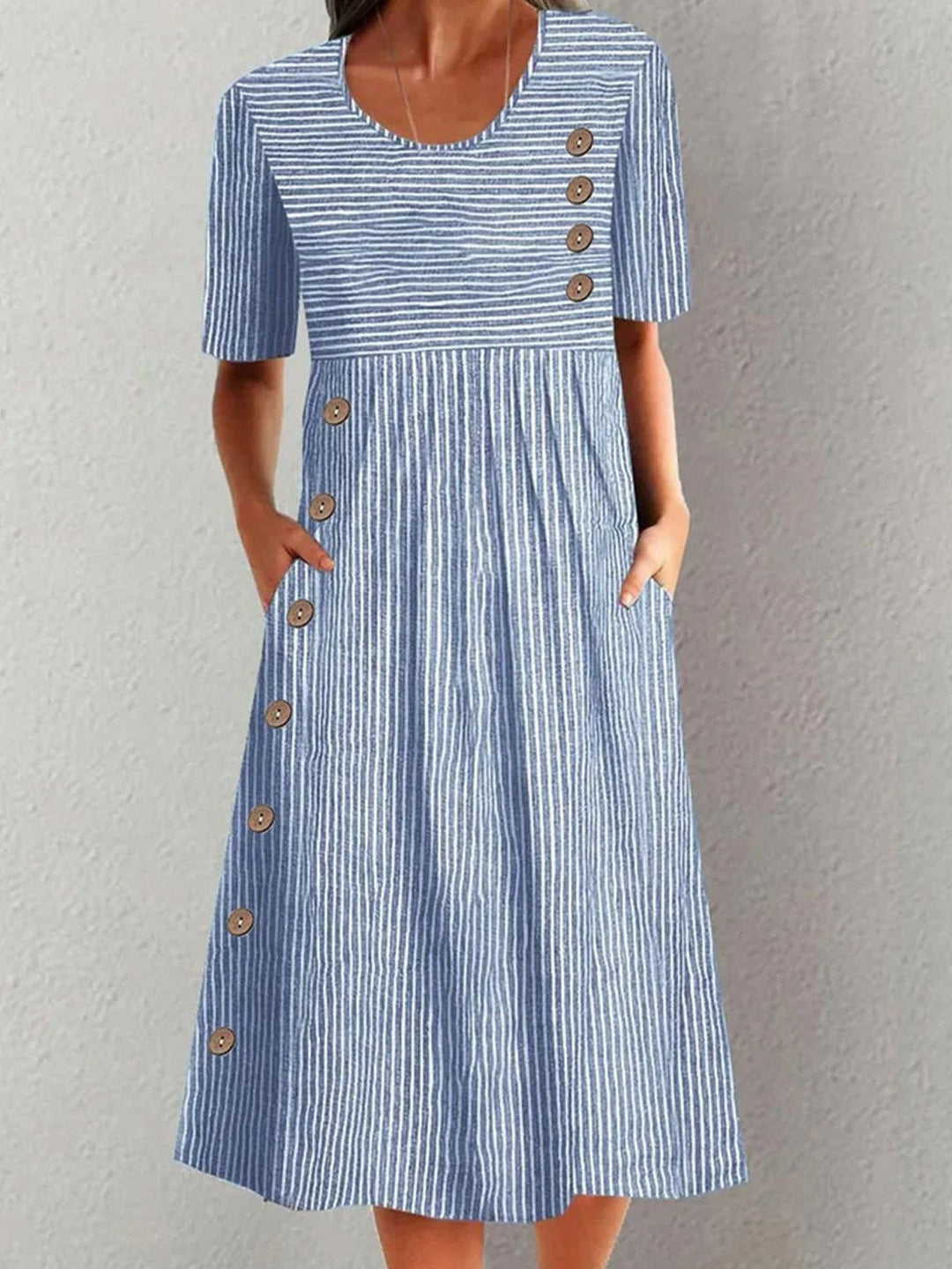 Women's blue striped midi dress with short sleeves, relaxed fit for casual summer comfort and everyday wear.
