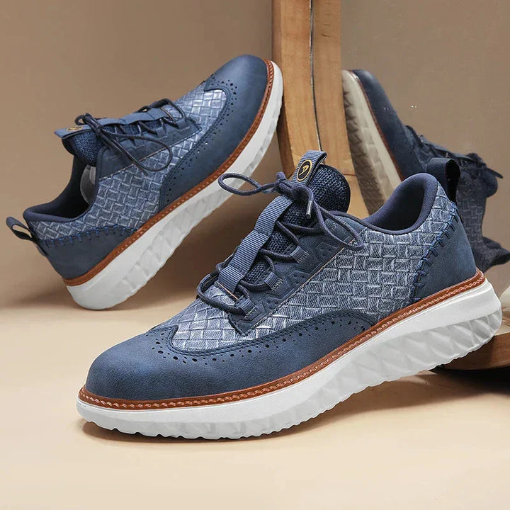 Textured blue woven sneakers for women, offering a comfortable and stylish option for daily wear.