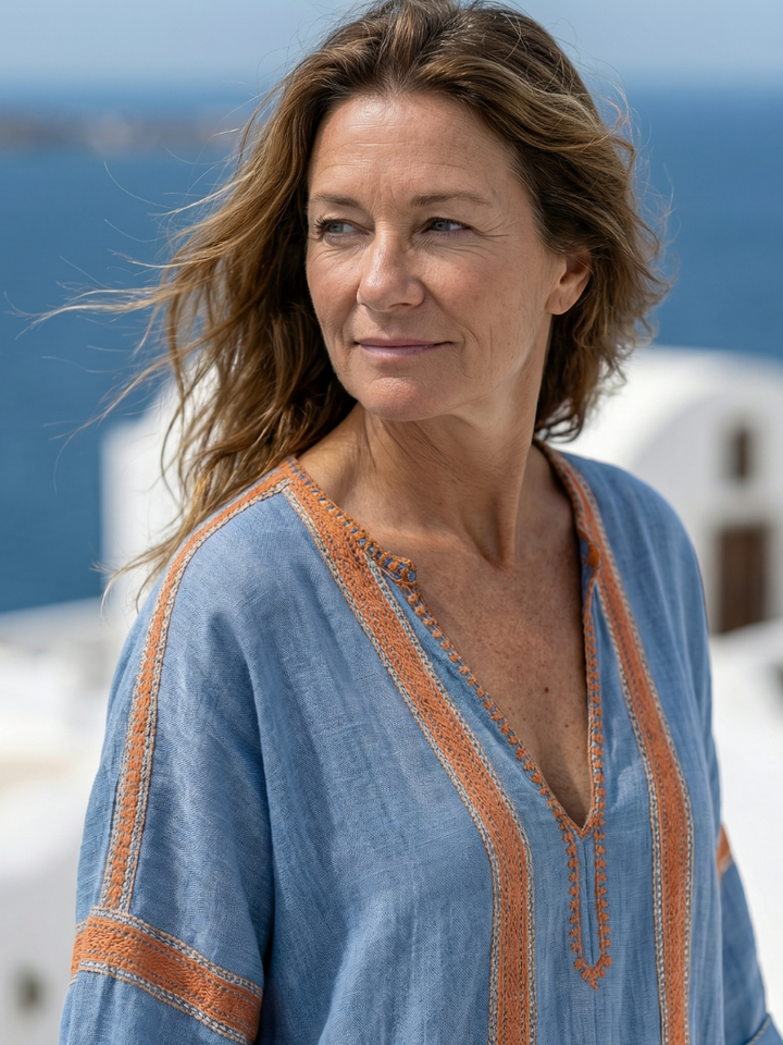 Soft structure blue V-neck midi dress for women, featuring short sleeves and a comfortable, relaxed fit.