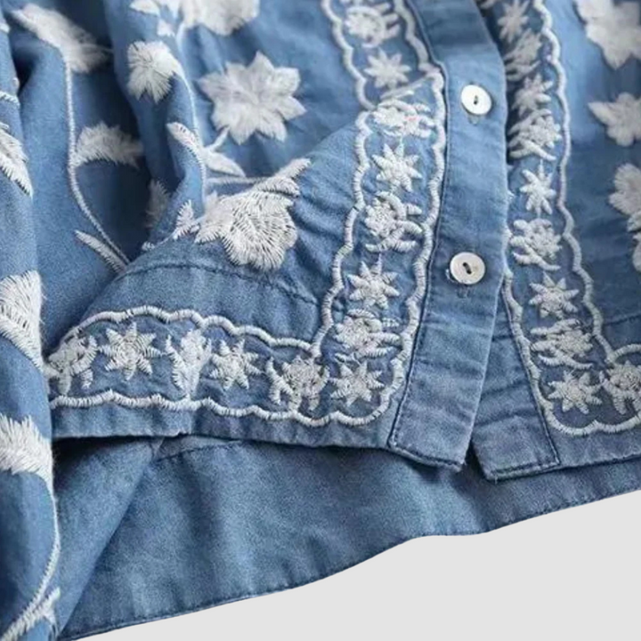 Chic women's bohemian cardigan with intricate floral embroidery & trendy drop-shoulder. Perfect outerwear for layering.