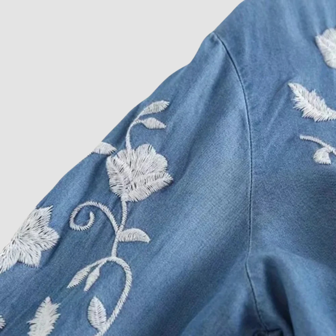 Soft women's embroidered bohemian cardigan, a relaxed fit drop-shoulder top with floral design, ideal for layering.