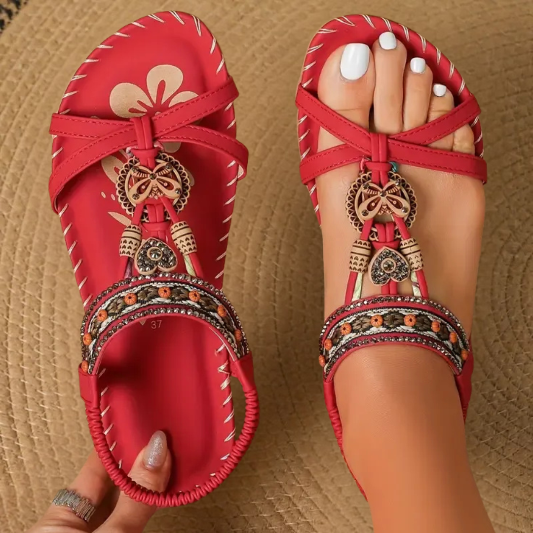 Beaded bohemian flat T-strap sandals for women, ideal summer shoes for festivals and beach vacations.