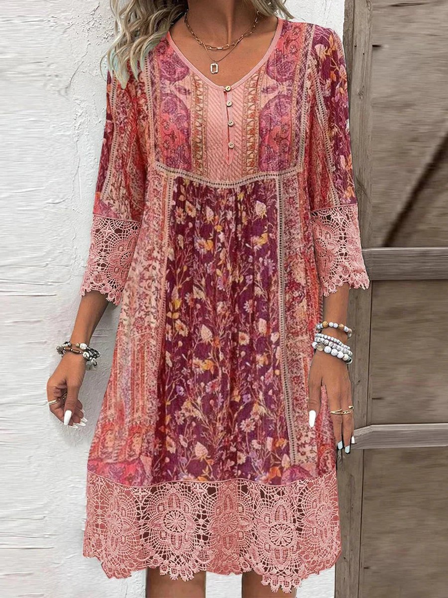 Elegant women's floral bohemian dress with delicate lace trim, three-quarter sleeves, and a flattering empire waist.
