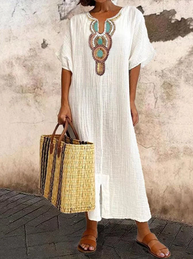 Effortless women's flowy kaftan dress, a versatile bohemian summer outfit for beach, vacation, or casual comfort.