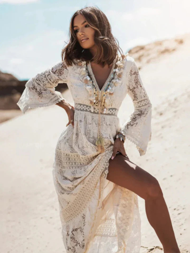 Boho chic women's long maxi dress with lace and flared sleeves, ideal for summer, beach, or casual elegant wear.