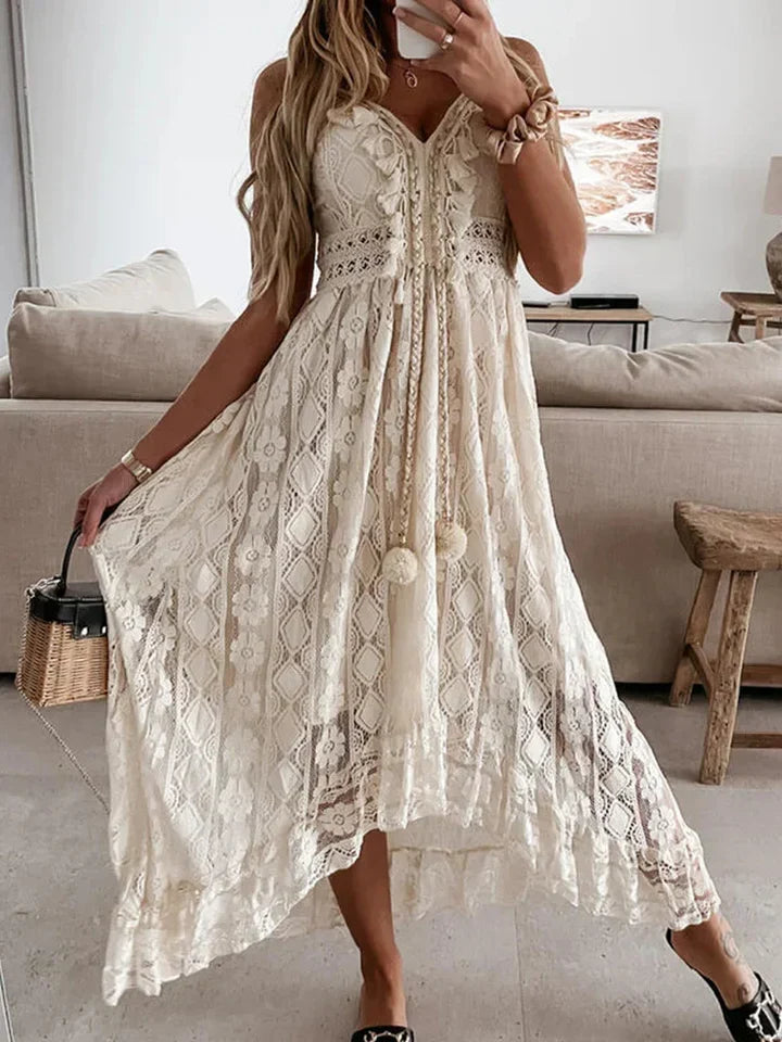 Versatile women's bohemian maxi dress, perfect for spring/summer, with beautiful lace & elegant flared sleeves.