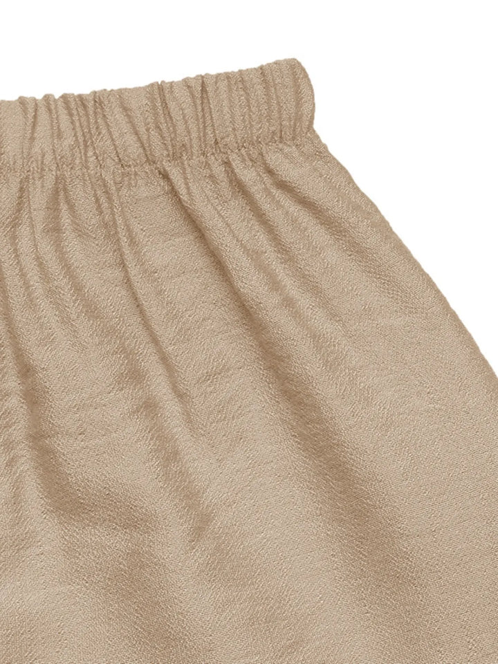 Kaki women's bohemian maxi skirt, elegantly pleated & flowing, suitable for summer casual outfits & vacation wear.