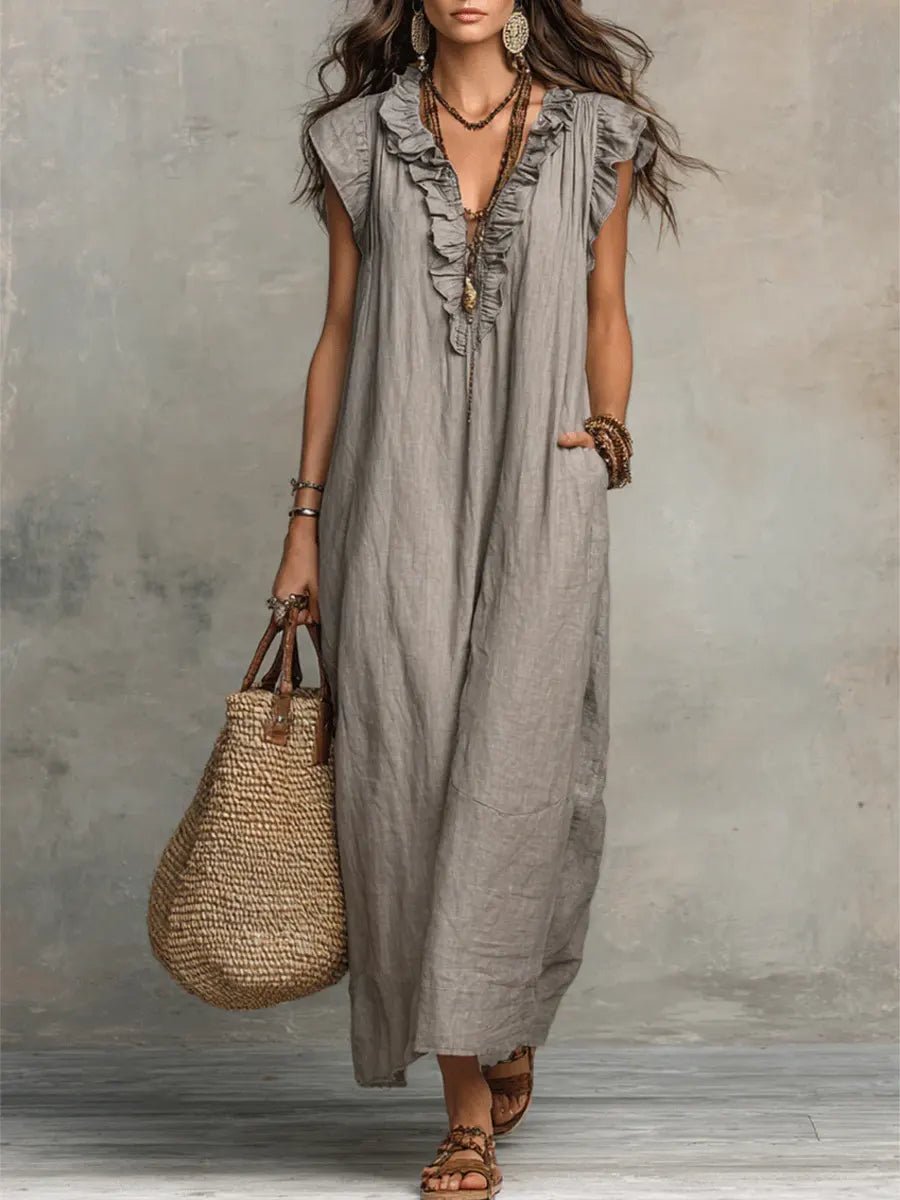 Women's Bohemian Ruffle V-Neck Maxi Dress with Flutter Sleeves. Perfect for summer and vacation.
