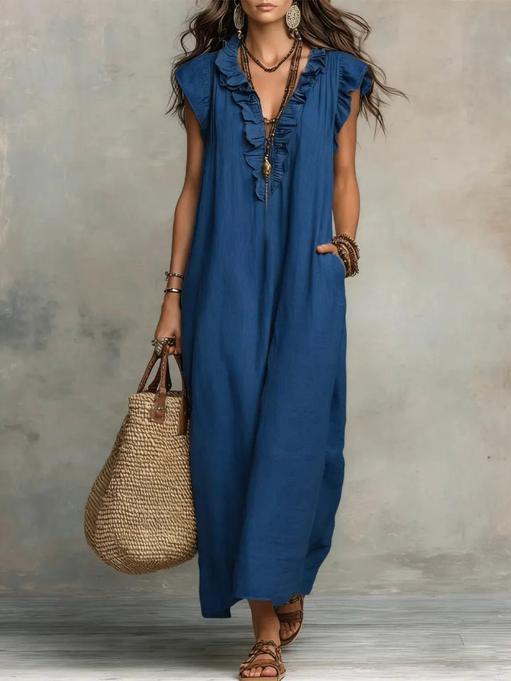 Casual Women's Bohemian Maxi Dress with stylish Ruffle V-Neck and airy Flutter Sleeves. Great for daywear.