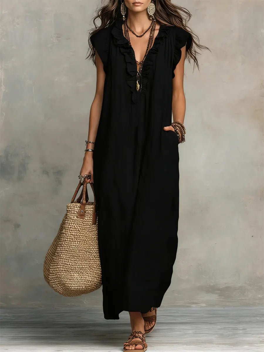 Stylish Women's Bohemian Maxi Dress, V-Neck & Ruffle design. Flutter sleeves make it ideal for summer elegance.