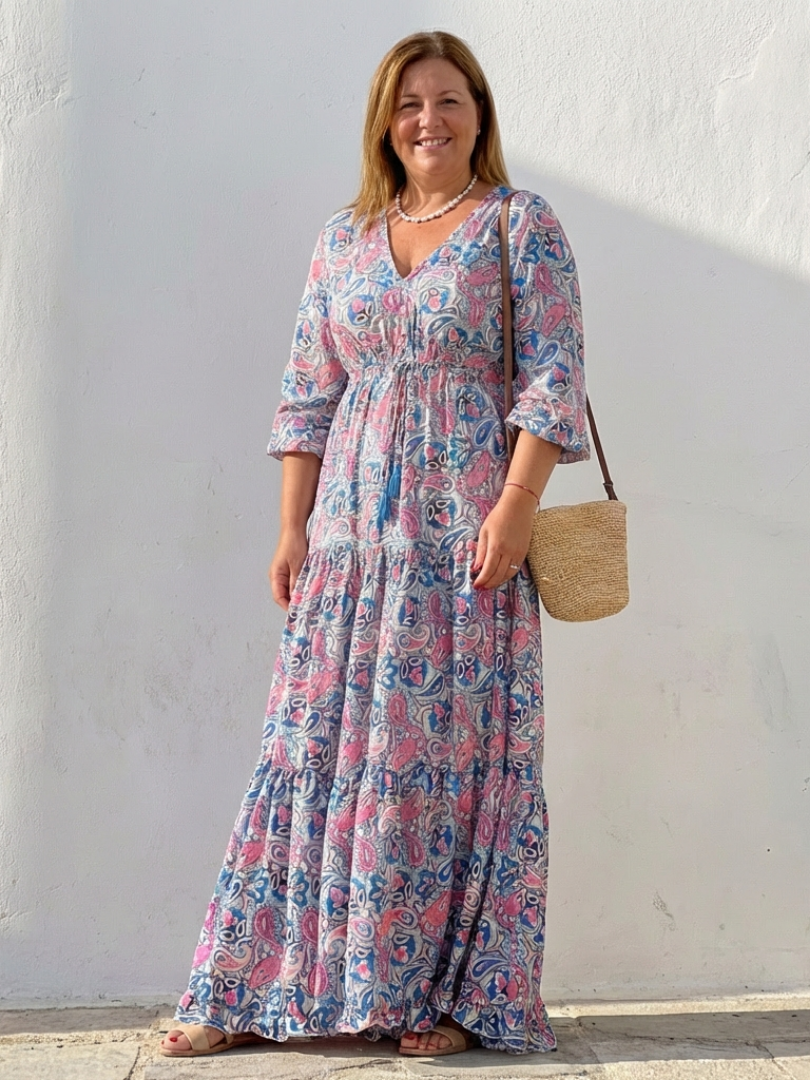 Relaxed fit women's bohemian maxi dress, V-neck, long sleeves. Comfortable and flowy for casual summer days.