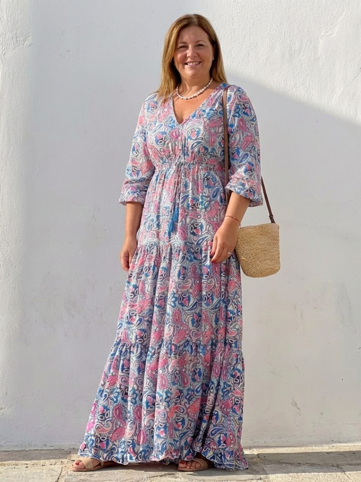 Relaxed fit women's bohemian maxi dress, V-neck, long sleeves. Comfortable and flowy for casual summer days.