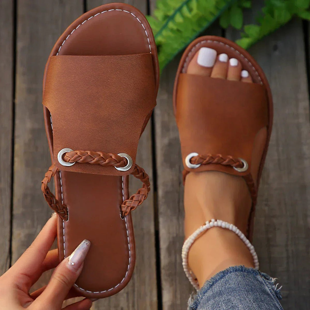 Women's boho flat sandals with braided straps, perfect for summer comfort and casual everyday wear.