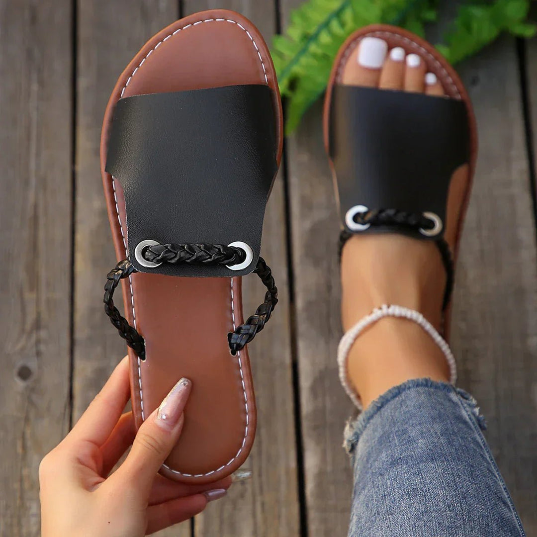 Comfortable women's braided ankle strap flat sandals, ideal for beach, vacation, or relaxed summer outings.