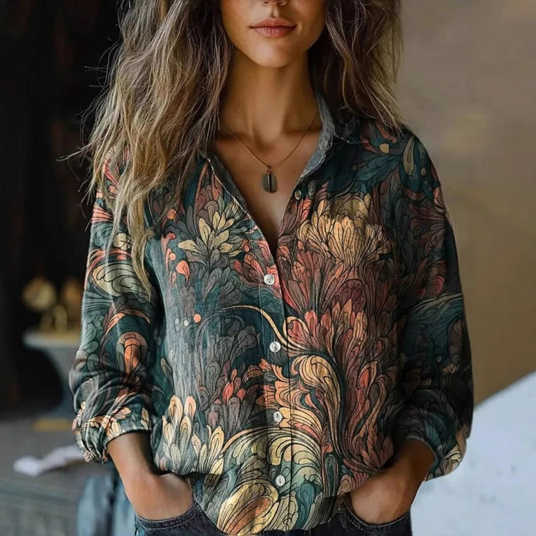 Chic women's boho long-sleeve button blouse with an intricate floral and paisley print.