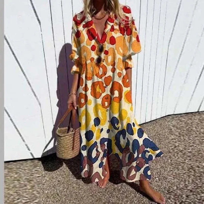 Elegant bohemian floral print maxi dress with long sleeves, ideal for summer vacations.