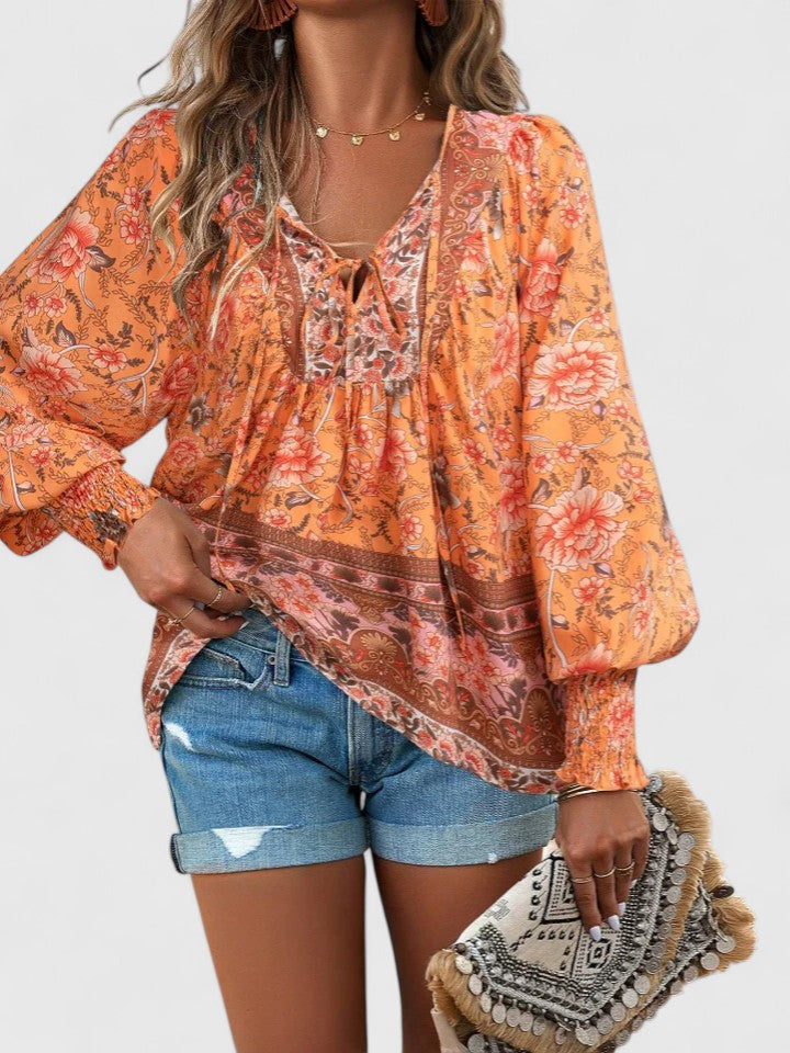 Stylish women's long sleeve floral boho peasant top, a relaxed fit for effortless spring and summer fashion.