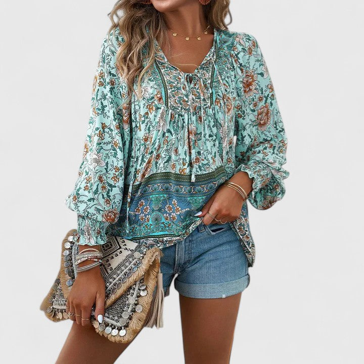 Spring fashion women's floral boho long sleeve peasant top, offering a relaxed and stylish everyday look.