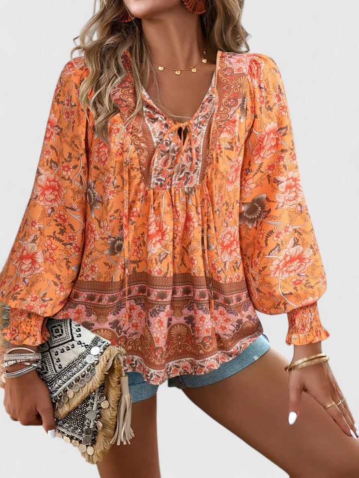 Boho floral long sleeve peasant top for women, relaxed fit, perfect for casual spring & summer wear.