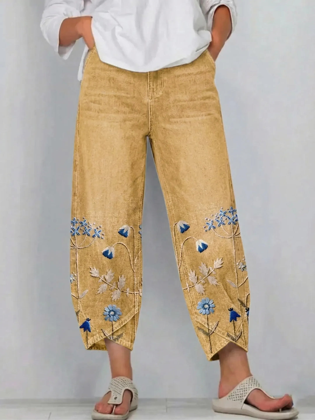 Lightweight women's floral boho print trousers with a relaxed fit, ideal for summer relaxation.