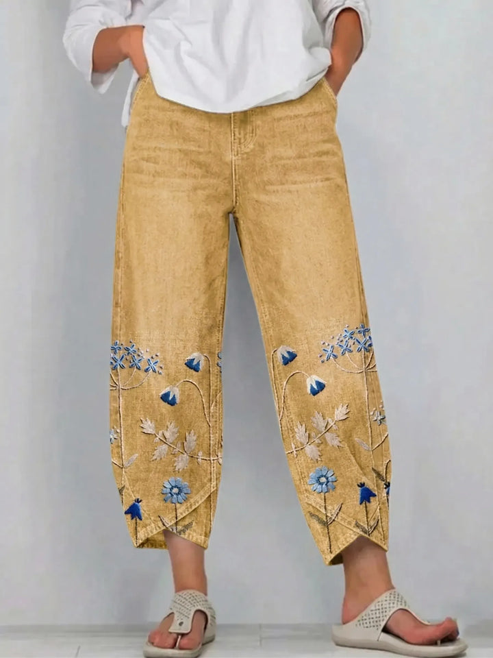 Lightweight women's floral boho print trousers with a relaxed fit, ideal for summer relaxation.