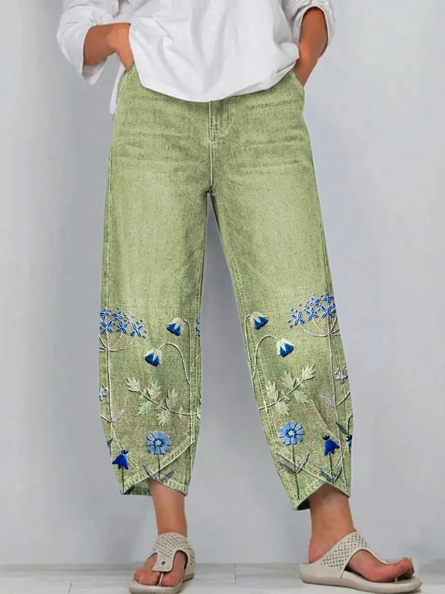 Vibrant floral print women's boho trousers. Lightweight and relaxed fit, perfect for summer casual wear.