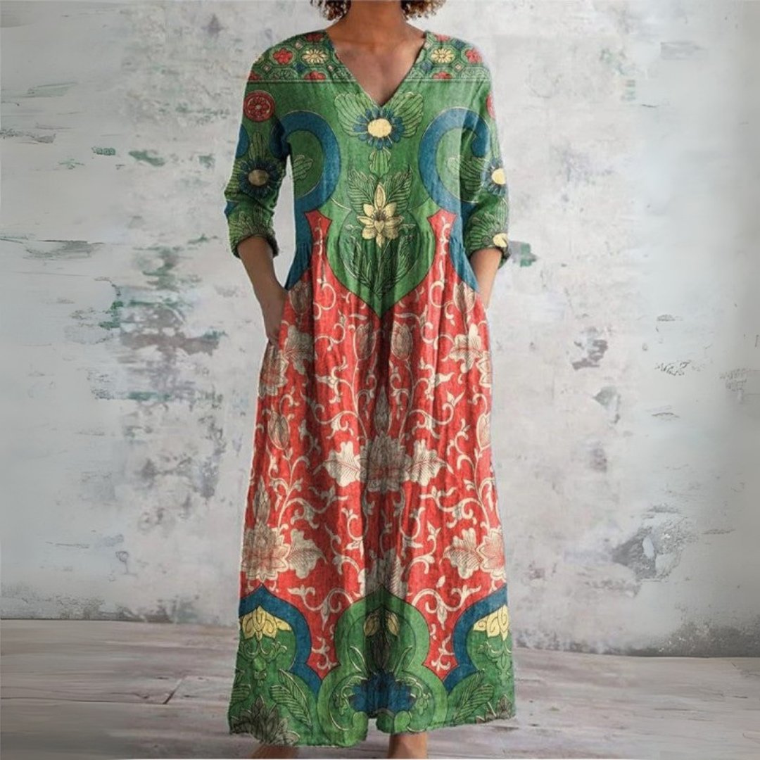 Women's Boho floral print maxi dress featuring a V-neck, long sleeves, and convenient pockets for summer casual.