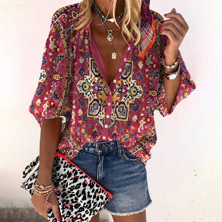 Relaxed fit women's bohemian floral print blouse with V-neck, long sleeves, and front buttons, for comfort & style.