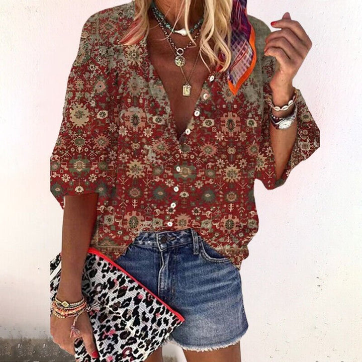 Vibrant floral print V-neck top for women, a stylish long sleeve button-down boho blouse, ideal for casual fashion.