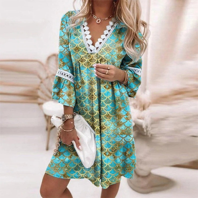 Casual summer women's mini dress featuring a boho floral print & V-neck, great for beach or vacation.