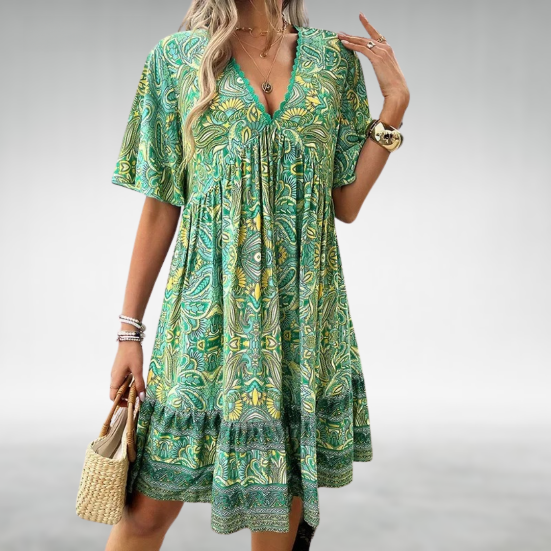 Women's boho floral V-neck mini dress. Perfect for summer, featuring a vibrant print and flowy short design.