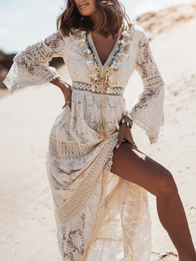 Elegant sleeveless V-neck boho maxi dress for women. Light, flowing fabric, great for summer beach fashion.