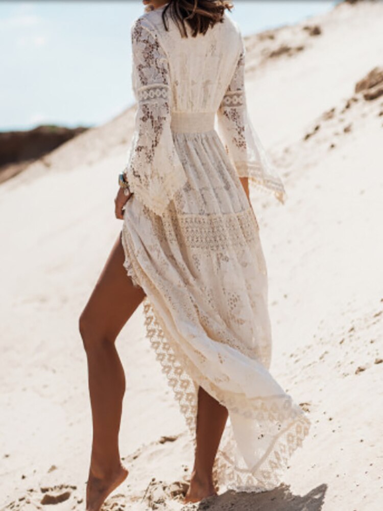 Comfortable women's flowing boho maxi dress, sleeveless. V-neck style, perfect for summer beach & travel.