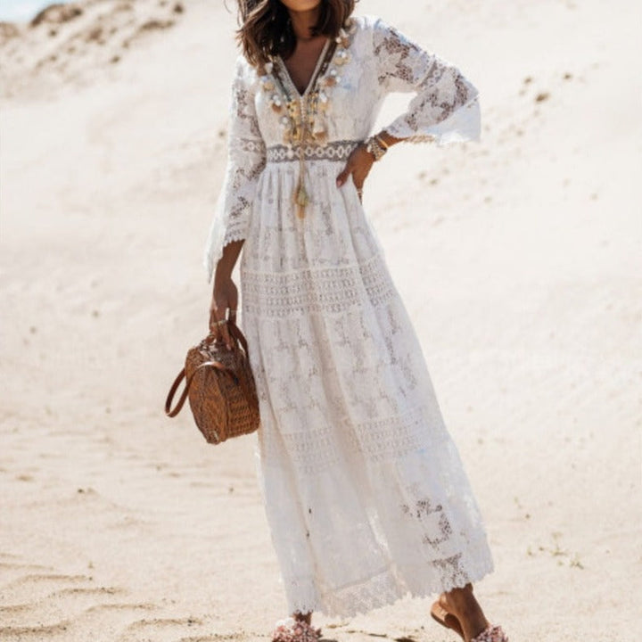 Stylish women's boho beach maxi dress, sleeveless. V-neck, creating a breezy summer holiday look.