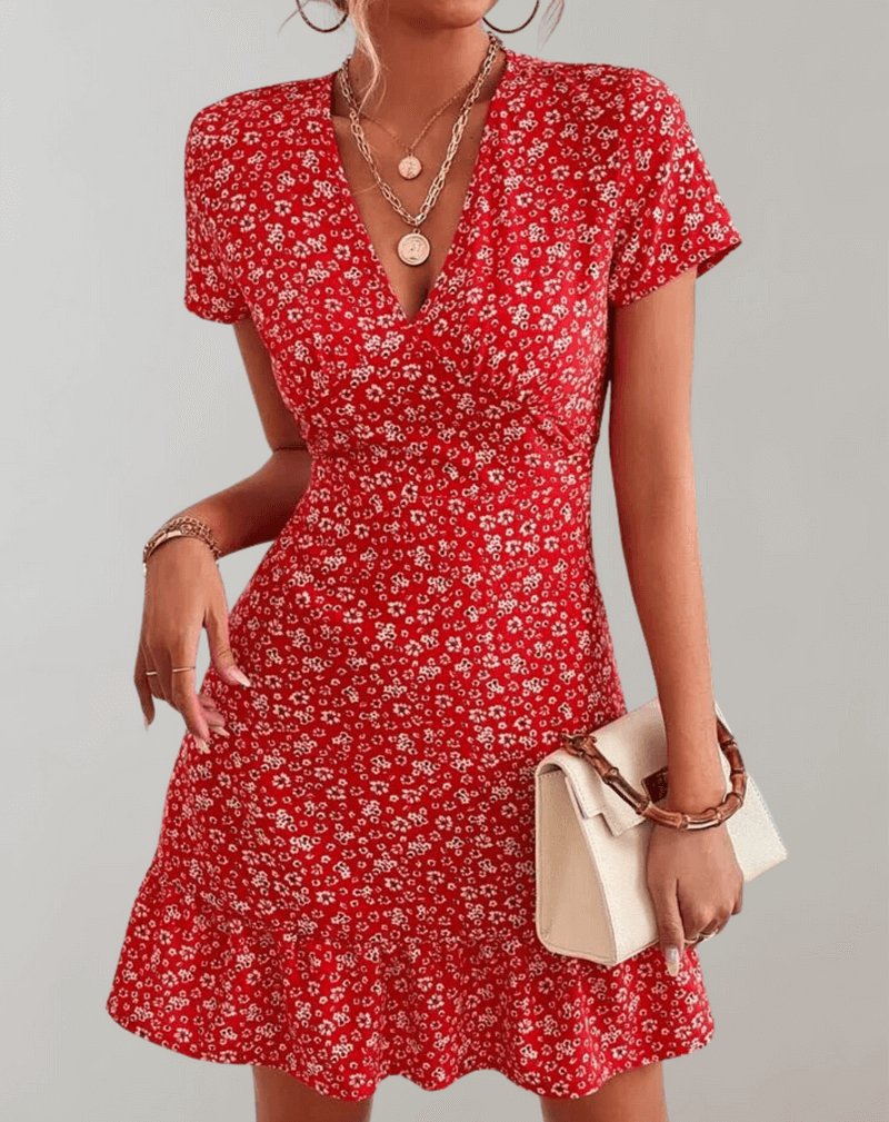 Women's boho flowing midi summer dress with elegant floral print. Perfect sleeveless bohemian style for vacation.