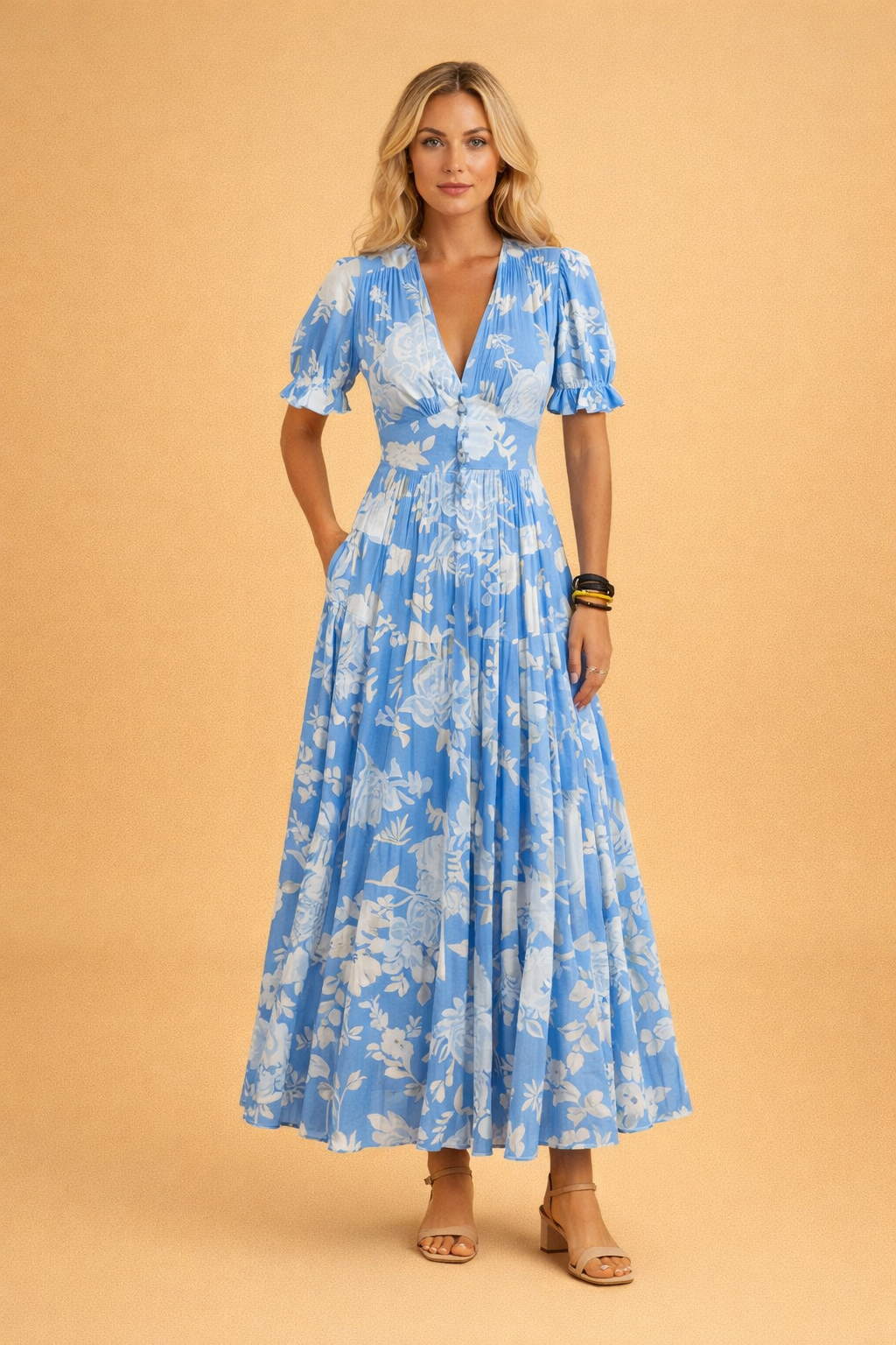 Casual women's flowy floral maxi dress, sleeveless, showing elegant drape, perfect for summer fashion.