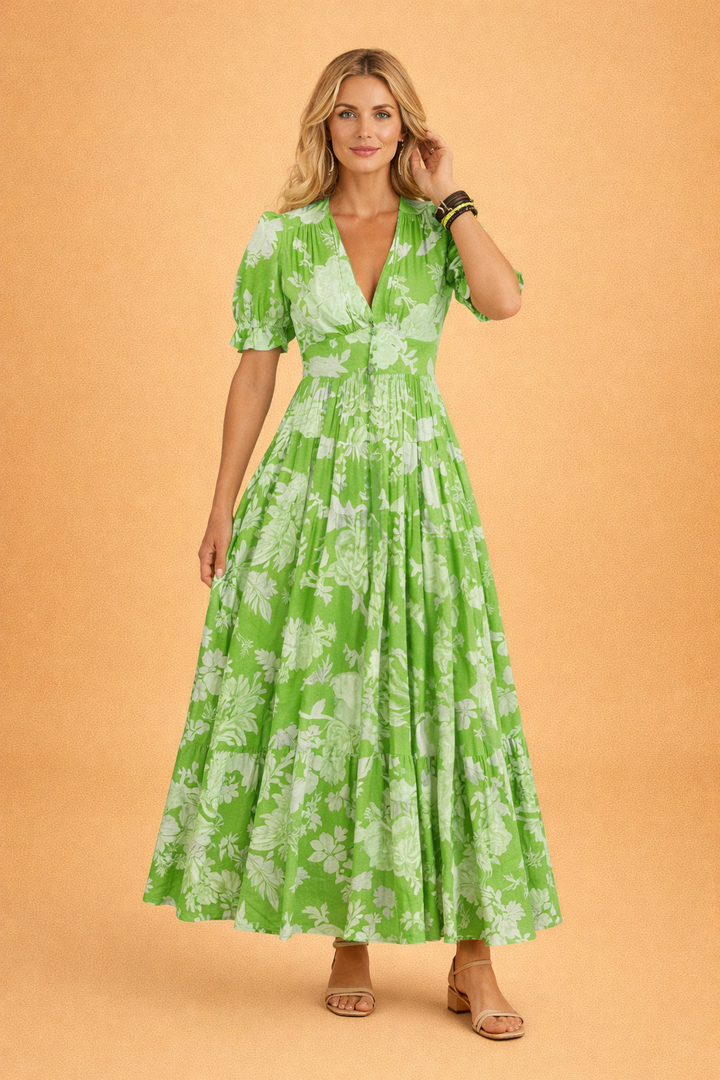 Woman in a stylish boho V-neck flowy floral maxi dress, perfect casual wear for summer vacation.