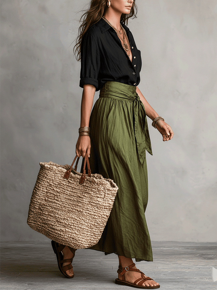 Elegant women's boho flowy skirt and top set, a versatile two-piece outfit for casual or vacation fashion.
