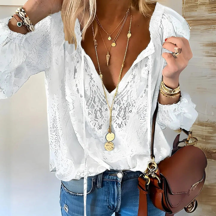 Elegant women's boho lace top, deep V-neck long sleeve blouse for versatile spring & summer casual wear.