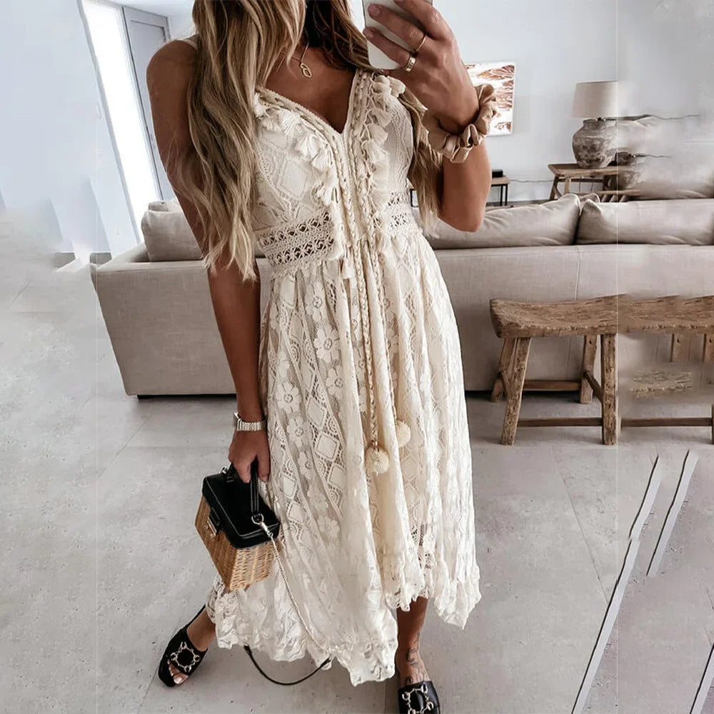 Women's boho lace tie-neck dress with tassels, perfect for summer style and beach holidays.