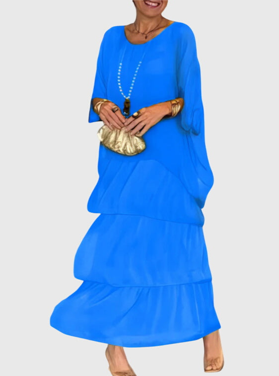 Versatile women's boho layered maxi dress, great for casual summer wear.