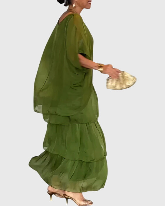 Elegant women's boho dress, layered maxi style for warm weather.