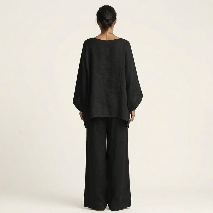 Complete women's boho linen blend two-piece set: a relaxed top & wide-leg pants for summer style.