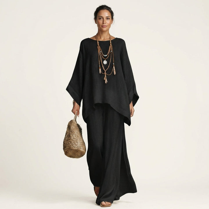 Effortless women's casual boho two-piece set in linen blend. Wide-leg pants & relaxed top for summer.
