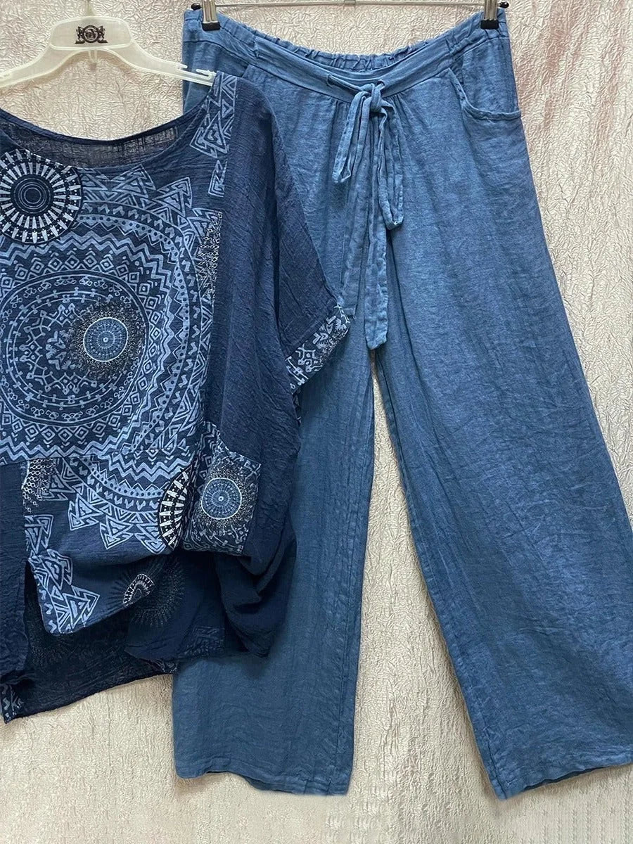 Stylish women's matching set with a loose-fit mandala print top and flowy wide-leg pants with drawstring waist.