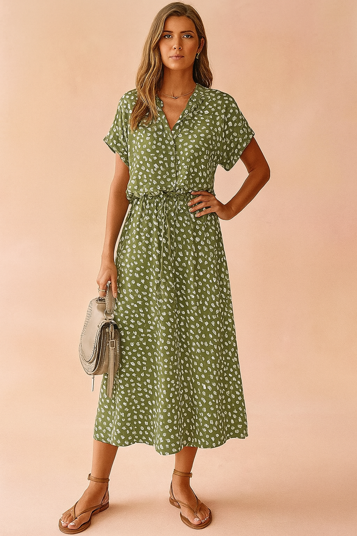 Stylish women's polka dot boho midi dress for summer. Perfect vacation outfit with a chic tie-waist.