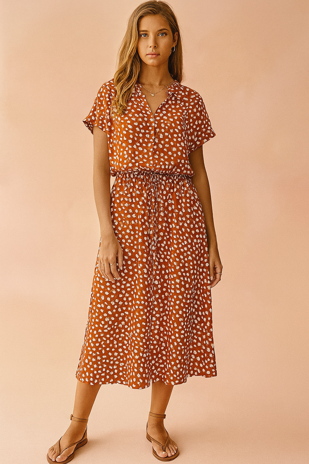 Flowy boho midi summer dress for women, featuring polka dots and a comfortable tie-waist design.