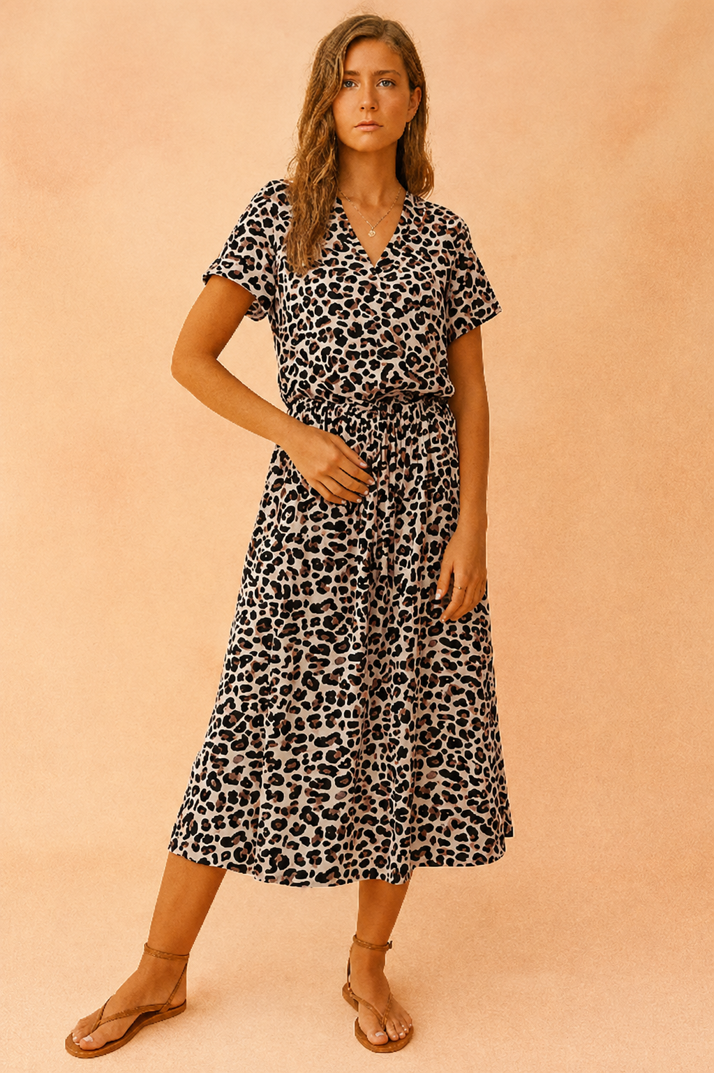 Chic women's polka dot boho midi dress with a tie-waist. Versatile summer wear, elegant for any occasion.