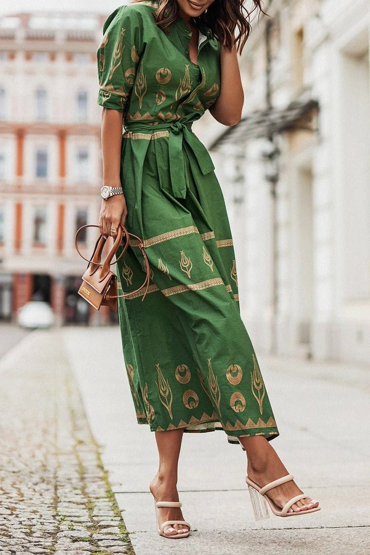 Stylish A-line women's midi dress featuring a vibrant boho print and flattering self-tie waist detail.